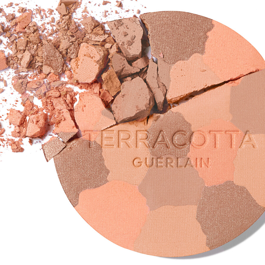 limited edition terracotta light introducing the new motif case ⋅ guerlain ⋅ guerlain
